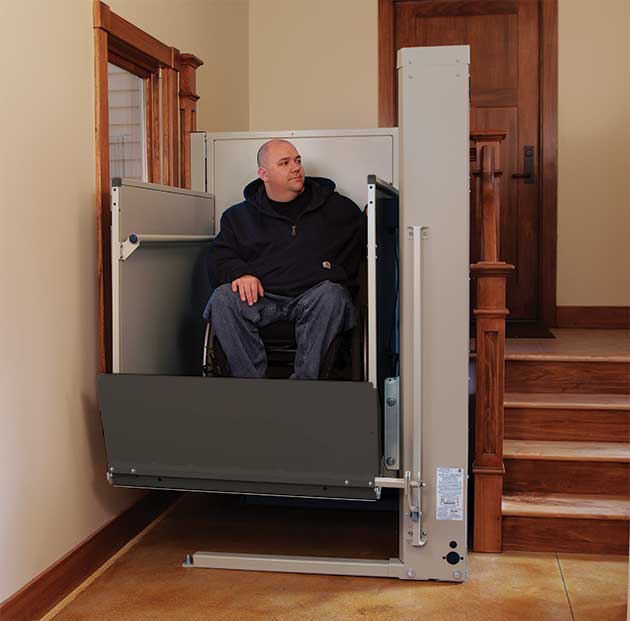 a vertical platform wheelchair lift in a home