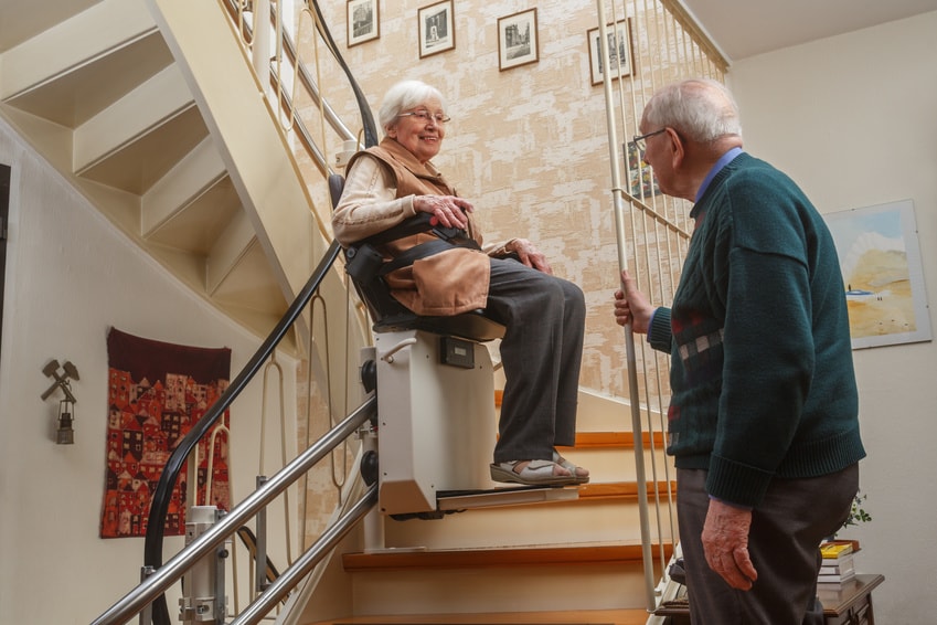 a woman using a stair lift